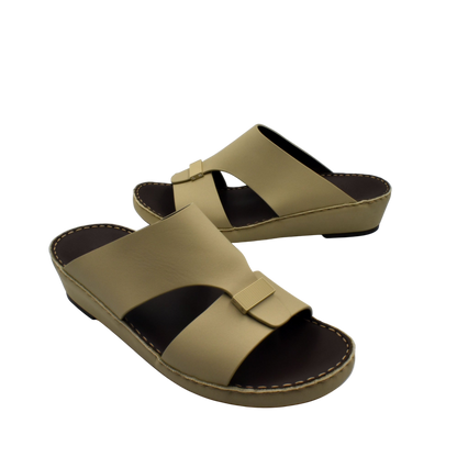 Beige Cerchio Gomato sandals with cross straps and cushioned sole from Private collection