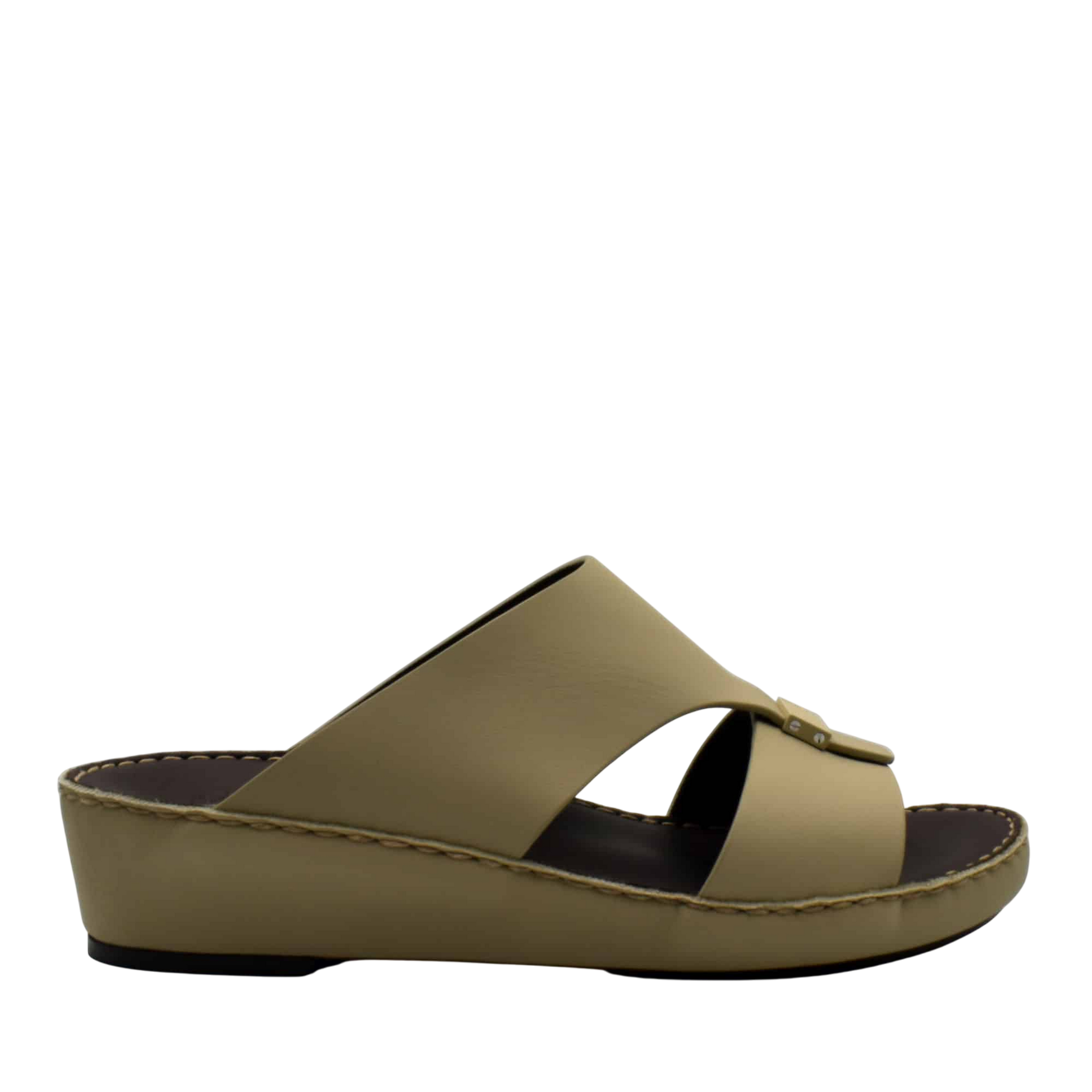 Side view of beige Cerchio Gomato sandals with a wedge sole and crossed straps